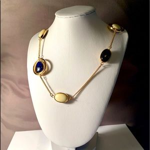 Long gold colored necklace